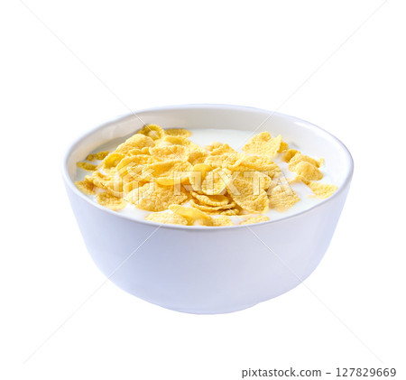 corn flakes with milk in a bowl isolated on a white background . corn flakes with milk in a bowl isolated on a white background . 127829669