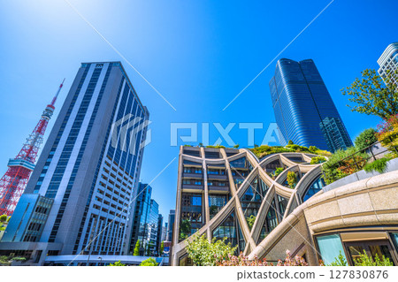 Tokyo cityscape in Japan: Towards a new era... (bustling with foreign tourists) View of Azabudai Hills and Tokyo Tower 127830876