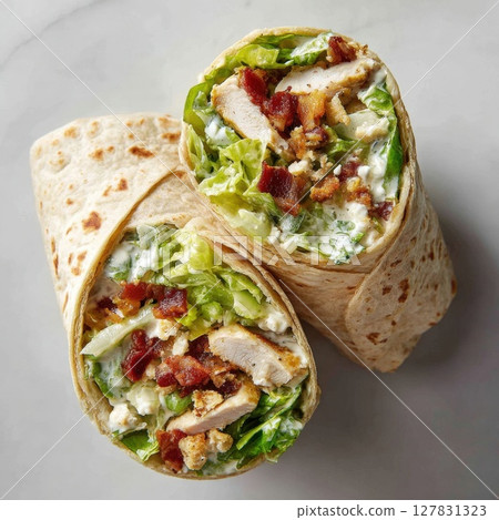 Irresistible Chicken Caesar Wrap A Deliciously Satisfying Meal Packed with Juicy Chicken, Crispy Bacon, Fresh Lettuce, and Creamy Caesar Dressing Perfect for a Quick and Flavorful Bite 127831323