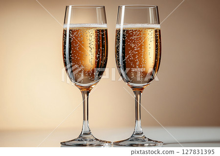 Luxurious drinking. Two elegant Wine Glass filled with Champagne wine. Luxurious drinking. Two elegant Wine Glass filled with Champagne wine. 127831395