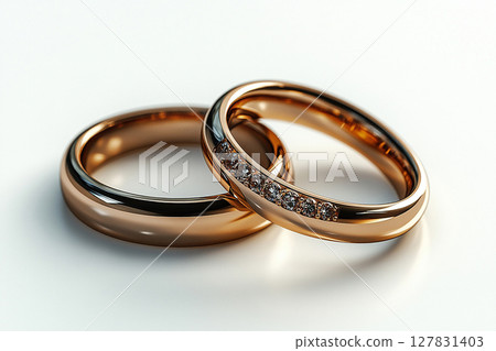 Pair of Wedding Rings on a white background. 127831403
