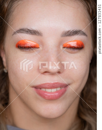 Caucasian woman undergoing eyelash lamination procedure. Top view.  127831431