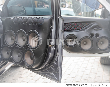 Powerful Car Audio Setup with Multiple Speakers for Enhanced Sound. Powerful Car Audio Setup with Multiple Speakers for Enhanced Sound. 127831497