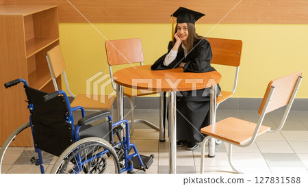 Celebrating Graduation in a Wheelchair Accessible Environment.  127831588