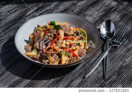 Pasta with beef, mushrooms and vegetables. Pasta with beef, mushrooms and vegetables. 127831803