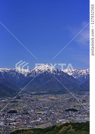 Omachi city and the Northern Alps as seen from Mount Takagari Omachi city and the Northern Alps as seen from Mount Takagari 127832568