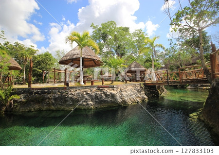 Mexico! The Tulum ruins, with their beautiful contrast with the Caribbean Sea, and Gran Cenote, with its beautiful curtain of light, in Cancun 127833103