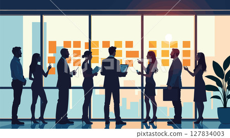 Diverse team brainstorming with sticky notes in modern office 127834003