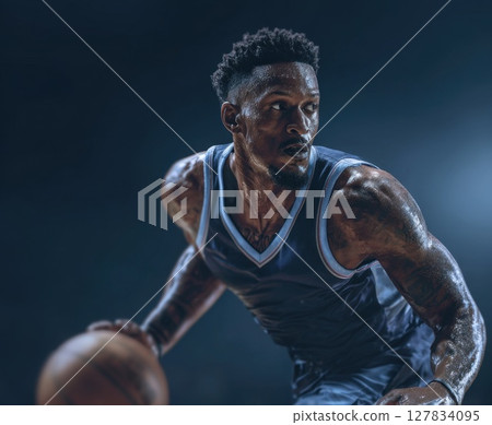 Dynamic Basketball Player in Action Intense Game Moment, Dribbling with Focus and Determination on the Court 127834095