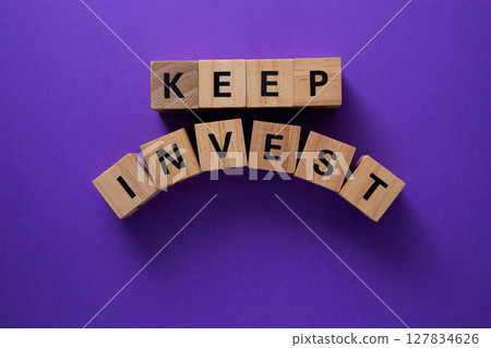 Keep investing in your future, financial advice with wooden cubes Keep investing in your future, financial advice with wooden cubes 127834626