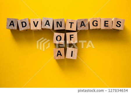 Advantages of artificial intelligence highlighted with wooden cubes on yellow background 127834634