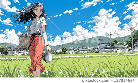 一名女子沿著稻田間的小路行走 一名女子沿著稻田間的小路行走 127834684