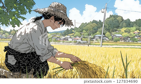 A woman working in a rice field 127834690