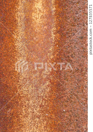 Background texture of red rust. Guardrail posts rusted with age. Background texture of red rust. Guardrail posts rusted with age. 127835571