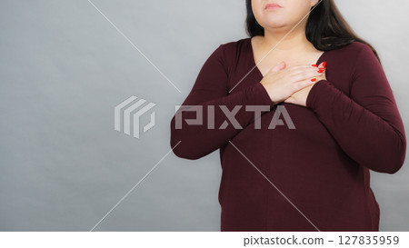 Adult woman having pain in chest 127835959