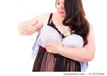 Woman plus size holding bra Woman plus size holding bra 127835994