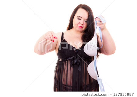 Woman plus size holding bra Woman plus size holding bra 127835997