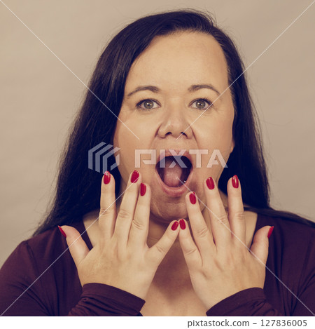 Shocked terrified adult woman Shocked terrified adult woman 127836005