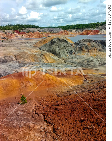 Quarry for the extraction of multi-colored clay Quarry for the extraction of multi-colored clay 127837093