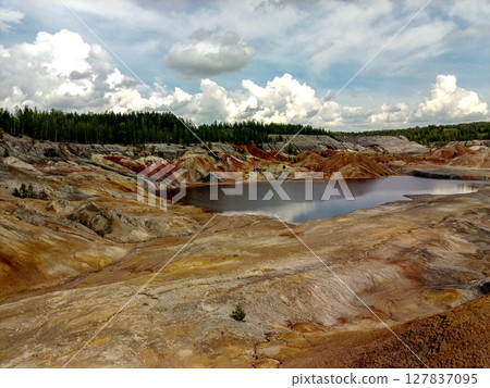 Quarry for the extraction of multi-colored clay 127837095