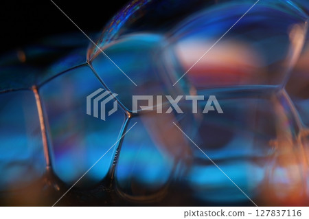 Blue liquid surface on black background, oil stains movement, bright chemistry, surreal background, blue sky colour, connection lines Blue liquid surface on black background, oil stains movement, bright chemistry, surreal background, blue sky colour, connection lines 127837116