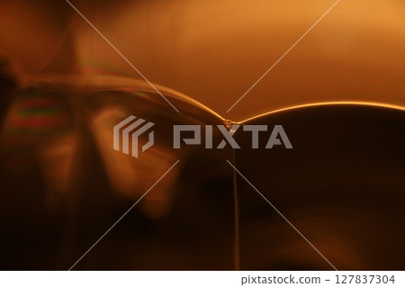 Oil production, brown bubbles in macro, texture of viscous black liquid, oil in laboratory Oil production, brown bubbles in macro, texture of viscous black liquid, oil in laboratory 127837304