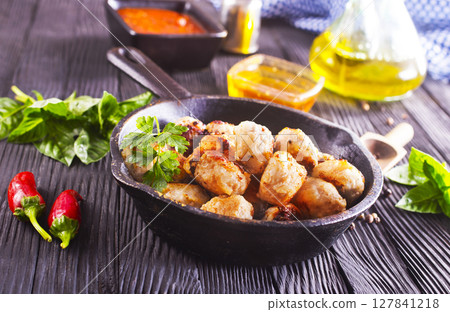 Meat meatballs with spices, sauce and garlic. Top view, copy space. Meat meatballs with spices, sauce and garlic. Top view, copy space. 127841218