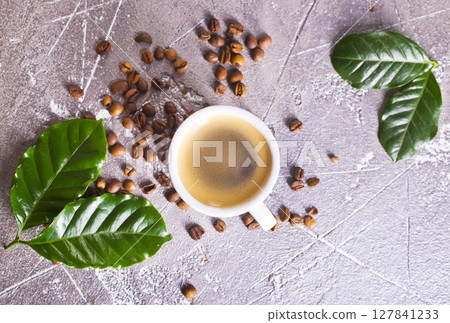 Coffee cup and coffee beans on gray background, Black coffee cup aromatic 127841233