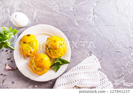 Baked pattypan squash , stuffed with cheese and meat Baked pattypan squash , stuffed with cheese and meat 127841237