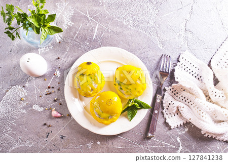 Baked pattypan squash , stuffed with cheese and meat Baked pattypan squash , stuffed with cheese and meat 127841238