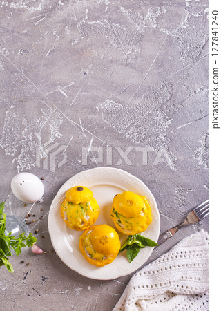 Baked pattypan squash , stuffed with cheese and meat Baked pattypan squash , stuffed with cheese and meat 127841240