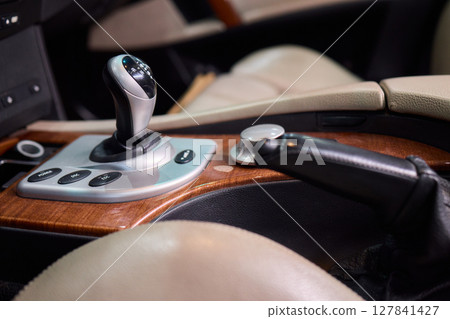 Macro shot of a car gear lever an essential auto part 127841427