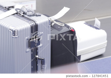 Checked suitcase at the airport 127841451