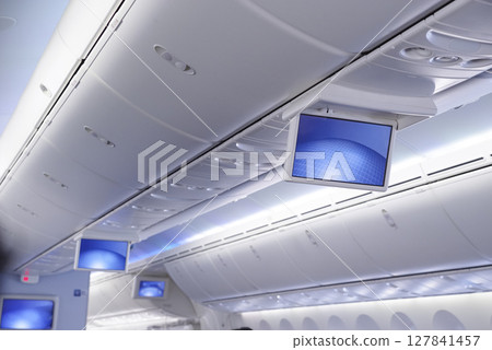 Baggage storage space on airplanes Baggage storage space on airplanes 127841457