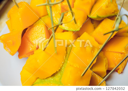 An Elegant and Colorful Fruit Platter Featuring a Variety of Exquisite Exotic Fruits An Elegant and Colorful Fruit Platter Featuring a Variety of Exquisite Exotic Fruits 127842032