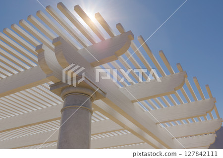Detail Abstract of A Beautiful Marble and Wood Pergola Patio Cover. Detail Abstract of A Beautiful Marble and Wood Pergola Patio Cover. 127842111