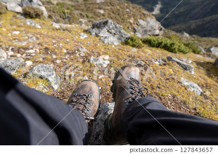 Looking at the difficult way I've been through on high altitude mountain top Looking at the difficult way I've been through on high altitude mountain top 127843657