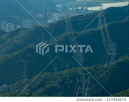 Aerial view of electricity tower on mountain Aerial view of electricity tower on mountain 127843674