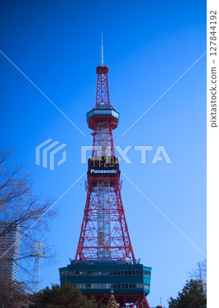 Sapporo TV Tower and Odori Park in winter with a clear blue sky Sapporo TV Tower and Odori Park in winter with a clear blue sky 127844192