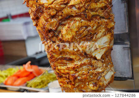 rotating traditional gyros meat close up rotating traditional gyros meat close up 127844286