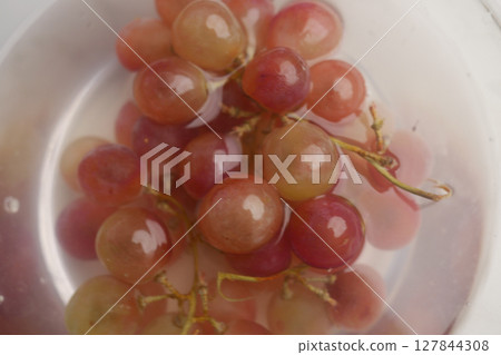 Fresh Grapes Soaking in Water Juicy and Sweet, Delicious Fruit Option 127844308