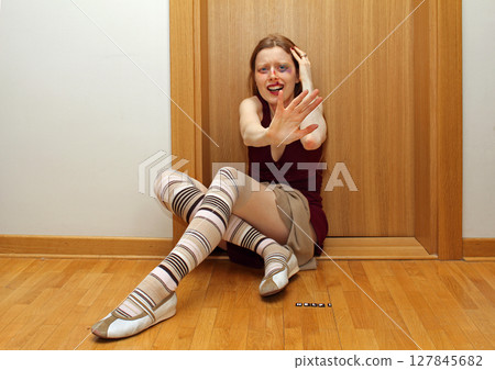 Beaten woman 127845682