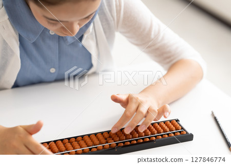 Abacus class, close-up of hands Abacus class, close-up of hands 127846774