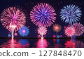 Fireworks reflected in the water 127848470
