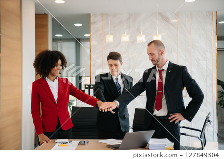 business people shaking hands during a meeting in office 127849304