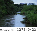 Rising river 127849422