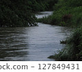 Rising river 127849431