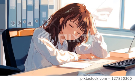 Exhausted Asian Office Worker Napping at Desk during Workday with Soft Sunlight 127850360