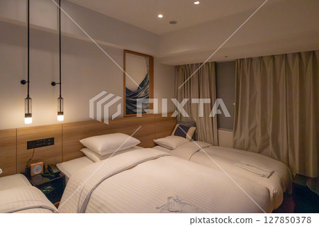 Beautiful triple room at Courtyard by Marriott Osaka Namba, a luxury hotel in Osaka city Beautiful triple room at Courtyard by Marriott Osaka Namba, a luxury hotel in Osaka city 127850378