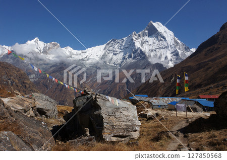 View of Machapuchare Peak from Annapurna Base Camp (ABC) in Nepal Himalaya. View of Machapuchare Peak from Annapurna Base Camp (ABC) in Nepal Himalaya. 127850568